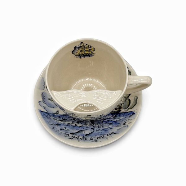 Порцелянова чайна чашка для вусів (moustache cup) на блюдце. 718625 фото