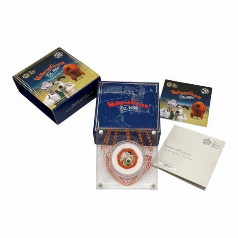 Срібна монета "Wallace & Gromit 2019 Sterling Silver Proof UK 50p Coin". 258317 фото