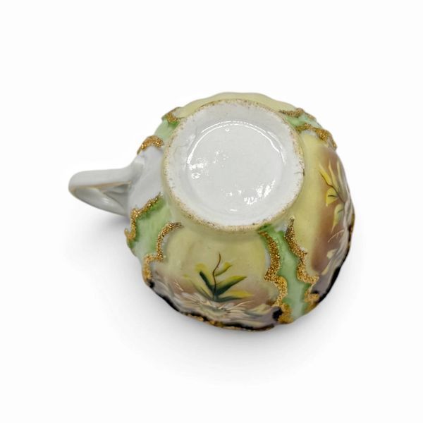 Порцелянова чайна чашка для вусів (moustache cup) на блюдце. 559987 фото