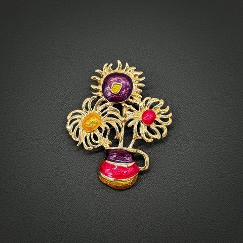 Брошка соняшники Avon, дизайн Yves Saint Laurent. 778288 фото