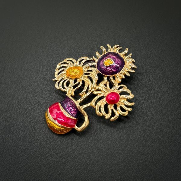 Брошь подсолнечник Avon, дизайн Yves Saint Laurent. 778288 фото